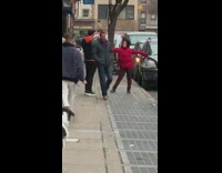 Red jacket girl sidewalk grate wind hair