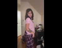 Pink shirt girl does buss it challenge 