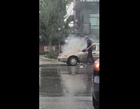 Car caught on fire at intersection