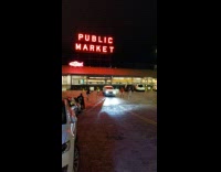 Three rappers rap music video shoot at the Public Market