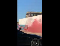 Woman dress jacket  pink smoke wall graffiti