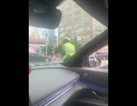 Cop dancing to mans loud music in car 