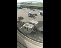 Luggage from the plane placed to the cart