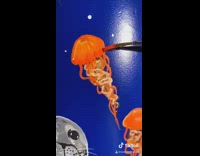 Girl paints blue scuba tank bottle jellyfish