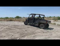 Polaris Off Road Vehicle tries to drift on dirt field