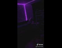 Black sweater guy bedroom LED flashing lights 