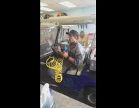 Blue golf cart guy black hat air 
