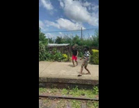 Two men tiktok dance at the train station Part 1