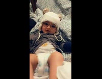 Baby with snapchat filter on stares at camera then farts 

