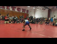 Little girl wrestles kid at game