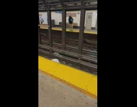 Guy looks for airpods on tracks 