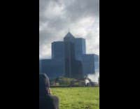 Crowd watching sheraton crossroads hotel implosion 