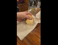 Employee at lamberts cafe throws bread towards submitter 
