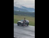 Collab IITW - Woman car sunroof poses at parking lot