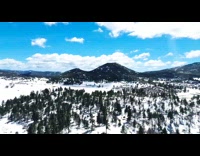 Last snow storm of year aerial shot
