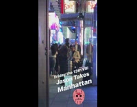 Guy in Jason Friday the 13th mask does resistance band bicep curls on the sidewalk