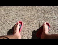 Man does rock and roll sign with toe fingers