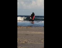 White bathing suit girl spins around beach 