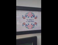 Collab BitchIG2 - Roommate with cross stitched embroidery art on wall