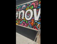 Guy Spray Paints Mural 