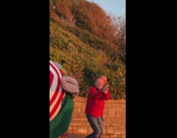 Guys drive convertible car dressed like elves 