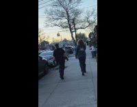 Guy wears blue black striped tail furry