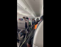 Plane turbulence cause passengers to move together