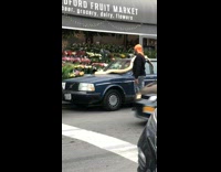Guy Lays Huge Snake on his Car 