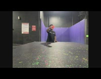 Kid black shirt bottle flip trampoline park