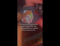 Woman walks on guy at club 