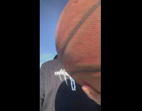 Man shoots ball backwards and it goes in