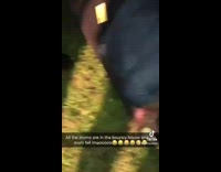 Mom inside of bounce house stuck on side 