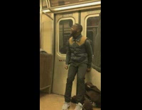Guy on subway raps and makes beats on door