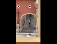 Collab IITW - Woman blue dress sits on shoulder of man