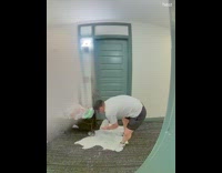 Man pulls cart spilled milk on carpet