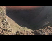 Guy stands on top of volcano Italy 