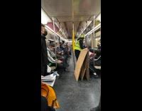 Man yellow vest dance got food subway