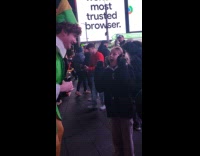 Elf talks to little girl on street