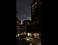 Cat eyes projected on the building wall