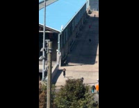 Woman dance alone under sunlight at pier