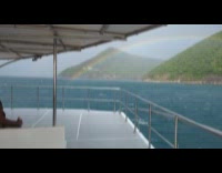 Full rainbow arch appeared during rain storm 