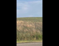Blue aircraft glider plane fly over hill