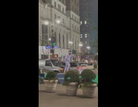 Bearded Man Jumps on Top of Blockade