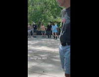 People hold hands dance park blue shorts