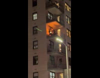 Man burning things in burner on patio