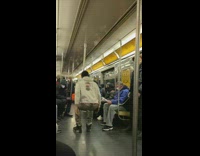 Guy spins on pole and does breaking dance  