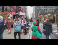 Guy with horns and claws at SantaCon 