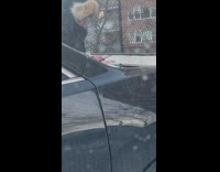 Man Holds and Smokes Cigarette with Fork