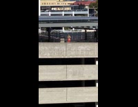 Girl dances alone empty parking structure 