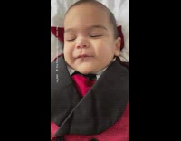 Baby in vampire costume with only two pointed teeth looks like fangs